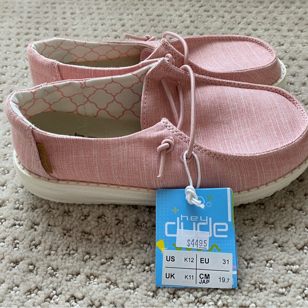 Brand new Hey Dude slip on shoes, Size 12